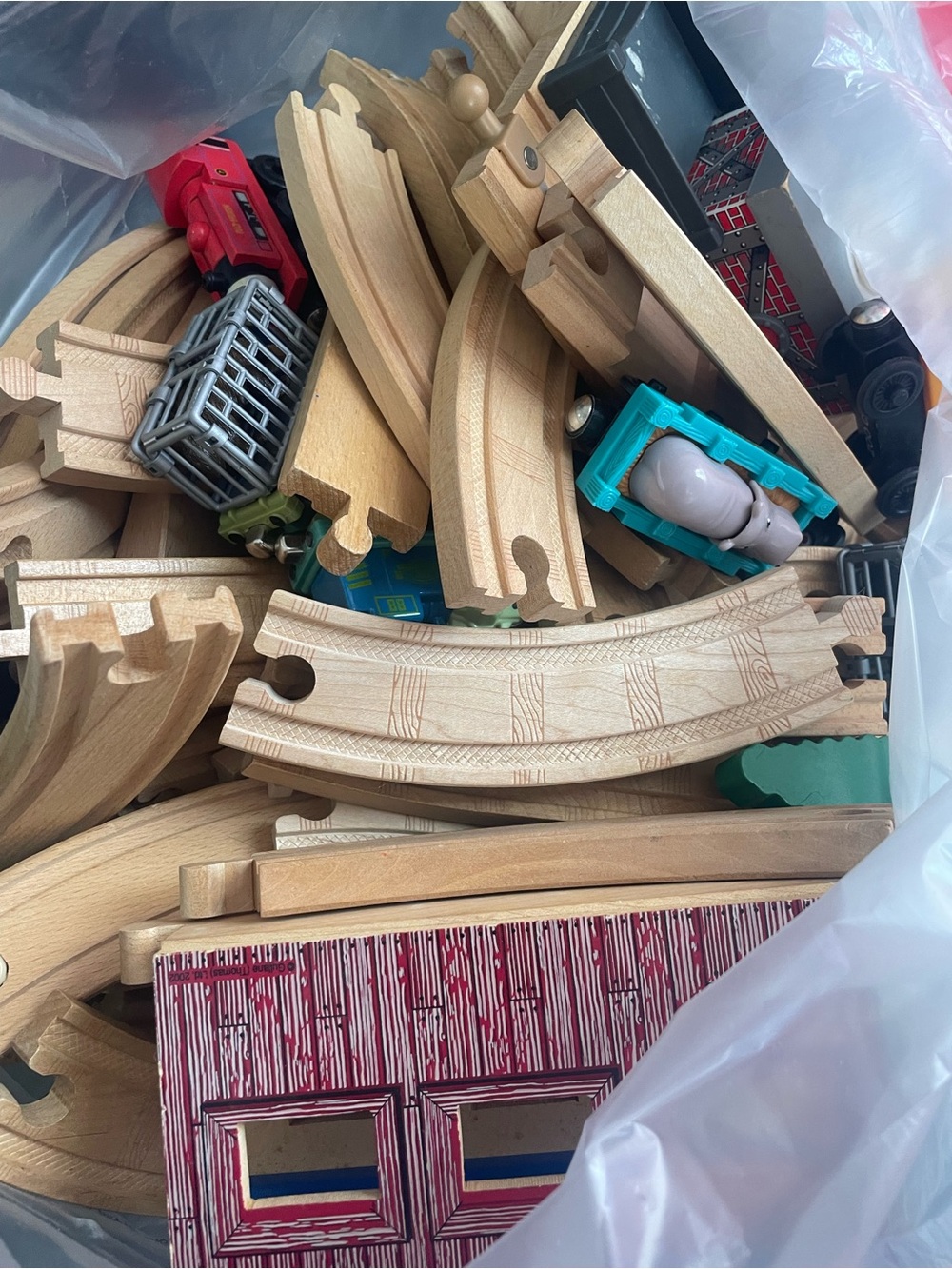 A Big Bag Of Thomas Train Tracks with Some Trains